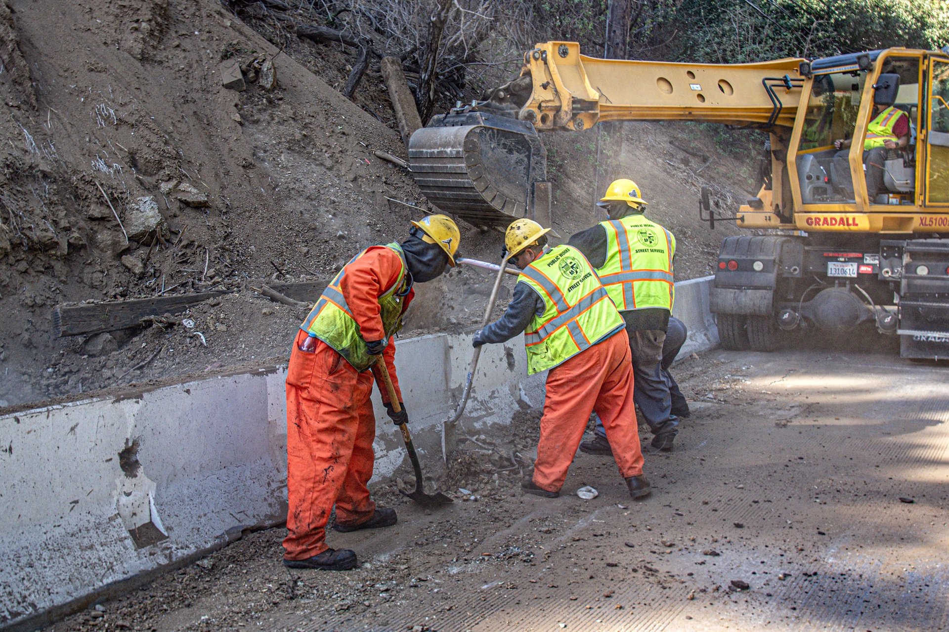 City workers cleaning debris