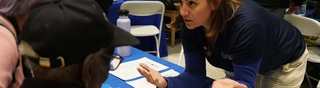 Case worker speaking to a person